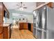 Kitchen with stainless steel appliances and wood cabinets at 1011 Susan Dr, Lake Wales, FL 33853