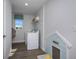 Laundry room with washer, dryer, and built-in pet area at 1621 Hummingbird Rd, Winter Haven, FL 33884