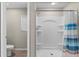 Bathroom with shower and toilet at 1536 Axel Cir, Winter Haven, FL 33880