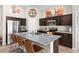 Modern kitchen with stainless steel appliances and granite countertops at 1536 Axel Cir, Winter Haven, FL 33880