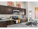 Modern kitchen with stainless steel appliances and granite countertops at 1536 Axel Cir, Winter Haven, FL 33880