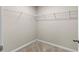 Large walk-in closet with wire shelving at 1536 Axel Cir, Winter Haven, FL 33880