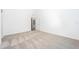 The main bedroom features an en suite bathroom and neutral carpet at 308 Bass Ct, Poinciana, FL 34759