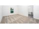 The bedroom features an en suite bathroom and plenty of natural light at 308 Bass Ct, Poinciana, FL 34759
