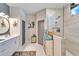 Double vanity bathroom with large walk-in shower at 4714 Dail Rd, Lakeland, FL 33813