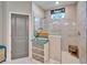 Bathroom with walk in shower and built in bench at 4714 Dail Rd, Lakeland, FL 33813