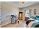Bedroom with daybed and home office area at 4714 Dail Rd, Lakeland, FL 33813