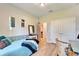 Bedroom with daybed and home office area at 4714 Dail Rd, Lakeland, FL 33813
