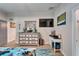 Bedroom featuring a vanity, dresser, and a large bed at 4714 Dail Rd, Lakeland, FL 33813