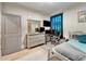Bright bedroom with built-in desk and ample closet space at 4714 Dail Rd, Lakeland, FL 33813