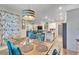 Open concept dining area with view of living room and kitchen at 4714 Dail Rd, Lakeland, FL 33813