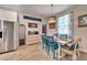 Bright dining room features a rustic wooden table with teal chairs at 4714 Dail Rd, Lakeland, FL 33813