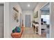 Bright and airy entryway with a comfortable bench and console table at 4714 Dail Rd, Lakeland, FL 33813