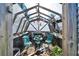 Charming greenhouse with seating area for gardening at 4714 Dail Rd, Lakeland, FL 33813