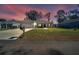 Two-car garage, front yard, and charming curb appeal at 4714 Dail Rd, Lakeland, FL 33813