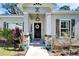 Welcoming front entrance with a black door and stone accents at 4714 Dail Rd, Lakeland, FL 33813
