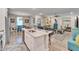 Open concept kitchen with island, stainless steel appliances and granite countertops at 4714 Dail Rd, Lakeland, FL 33813