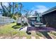 Outdoor patio with seating area and fire pit at 4714 Dail Rd, Lakeland, FL 33813