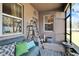 Relaxing screened porch with comfortable seating at 4714 Dail Rd, Lakeland, FL 33813