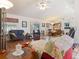 Spacious living room with hardwood floors and access to dining area at 3189 Winchester Estates Loop, Lakeland, FL 33810