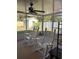 Screened porch with rocking chairs, overlooks backyard at 3189 Winchester Estates Loop, Lakeland, FL 33810