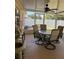 Screened porch with table and chairs, overlooks backyard at 3189 Winchester Estates Loop, Lakeland, FL 33810