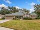 One-story house with attached garage and yard at 2000 Heatheroak Dr, Apopka, FL 32703