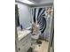 Clean bathroom with floral shower curtain and updated vanity at 401 Century Blvd # C, Auburndale, FL 33823