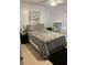 Bright bedroom with a comfy bed and tasteful decor at 401 Century Blvd # C, Auburndale, FL 33823