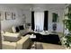 Comfortable living room featuring sectional sofa and coffee table at 401 Century Blvd # C, Auburndale, FL 33823