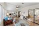 Sunroom with ample natural light, seating, and a workspace at 1724 Magnolia Ave, Lady Lake, FL 32159