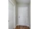 Clean hallway featuring wood floors at 6244 Sw 96Th Pl, Ocala, FL 34476