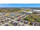Aerial view of house and surrounding neighborhood at 8710 Hinsdale Heights Dr, Polk City, FL 33868