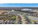 Aerial view of a house in a residential neighborhood at 8710 Hinsdale Heights Dr, Polk City, FL 33868