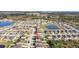 Aerial view of house and surrounding neighborhood at 8710 Hinsdale Heights Dr, Polk City, FL 33868