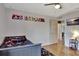 bedroom with gaming theme and access to hallway at 8710 Hinsdale Heights Dr, Polk City, FL 33868