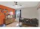 bedroom with gaming theme and a large window at 8710 Hinsdale Heights Dr, Polk City, FL 33868