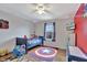 bedroom with a superhero theme and plenty of storage at 8710 Hinsdale Heights Dr, Polk City, FL 33868