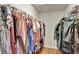 Large walk-in closet with ample hanging space and shelving at 8710 Hinsdale Heights Dr, Polk City, FL 33868