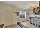 Bright entryway with a view into a home bar area at 8710 Hinsdale Heights Dr, Polk City, FL 33868