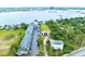Aerial view of waterfront property with building and boat at 900 S Peninsula Dr # 102, Daytona Beach, FL 32118