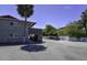 Parking area with building and palm trees in view at 900 S Peninsula Dr # 102, Daytona Beach, FL 32118