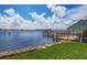 Scenic waterfront view with dock, gazebo and bridge at 900 S Peninsula Dr # 102, Daytona Beach, FL 32118