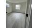 Bright bedroom with window and flooring at 1227 Waterview W Blvd, Lakeland, FL 33801