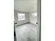 Bedroom with large window and grey floor at 1227 Waterview W Blvd, Lakeland, FL 33801
