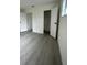 Simple bedroom with grey flooring at 1227 Waterview W Blvd, Lakeland, FL 33801