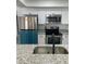 Modern kitchen featuring stainless steel appliances and granite countertops at 1227 Waterview W Blvd, Lakeland, FL 33801