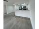 Open concept living room with new flooring at 1227 Waterview W Blvd, Lakeland, FL 33801
