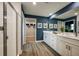 Elegant bathroom with double vanity and a walk-in shower at 6224 Sw 95Th Pl, Ocala, FL 34476