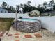 Above ground pool with brick-patterned surround at 15324 Sw 40Th Place Rd, Ocala, FL 34481